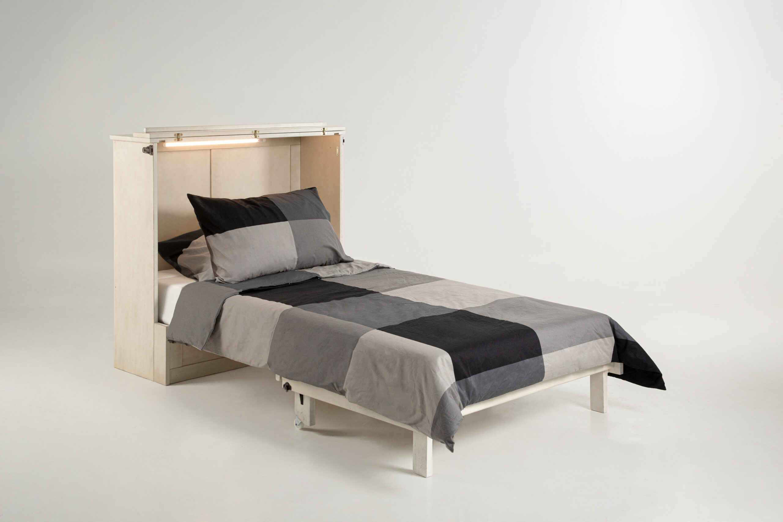 Murphy Express Twin Provence 5 Light on - SDS Cabinet Beds Wooden bed frame with a built-in headboard and a gray-black striped duvet against a plain light wall.